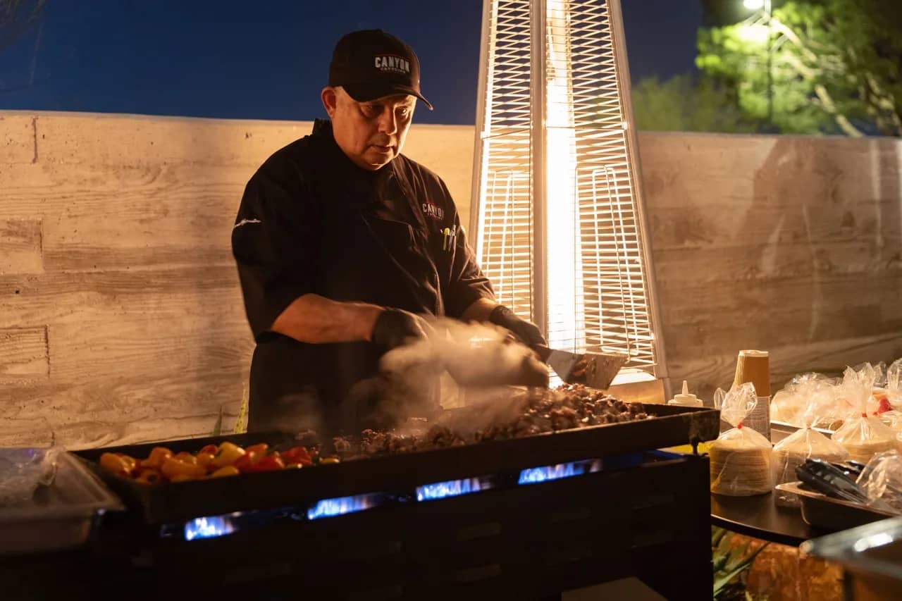 Canyon Catering Employee Cooking Food