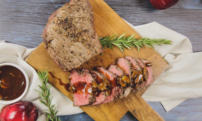 Tri - tip steak served at catering event
